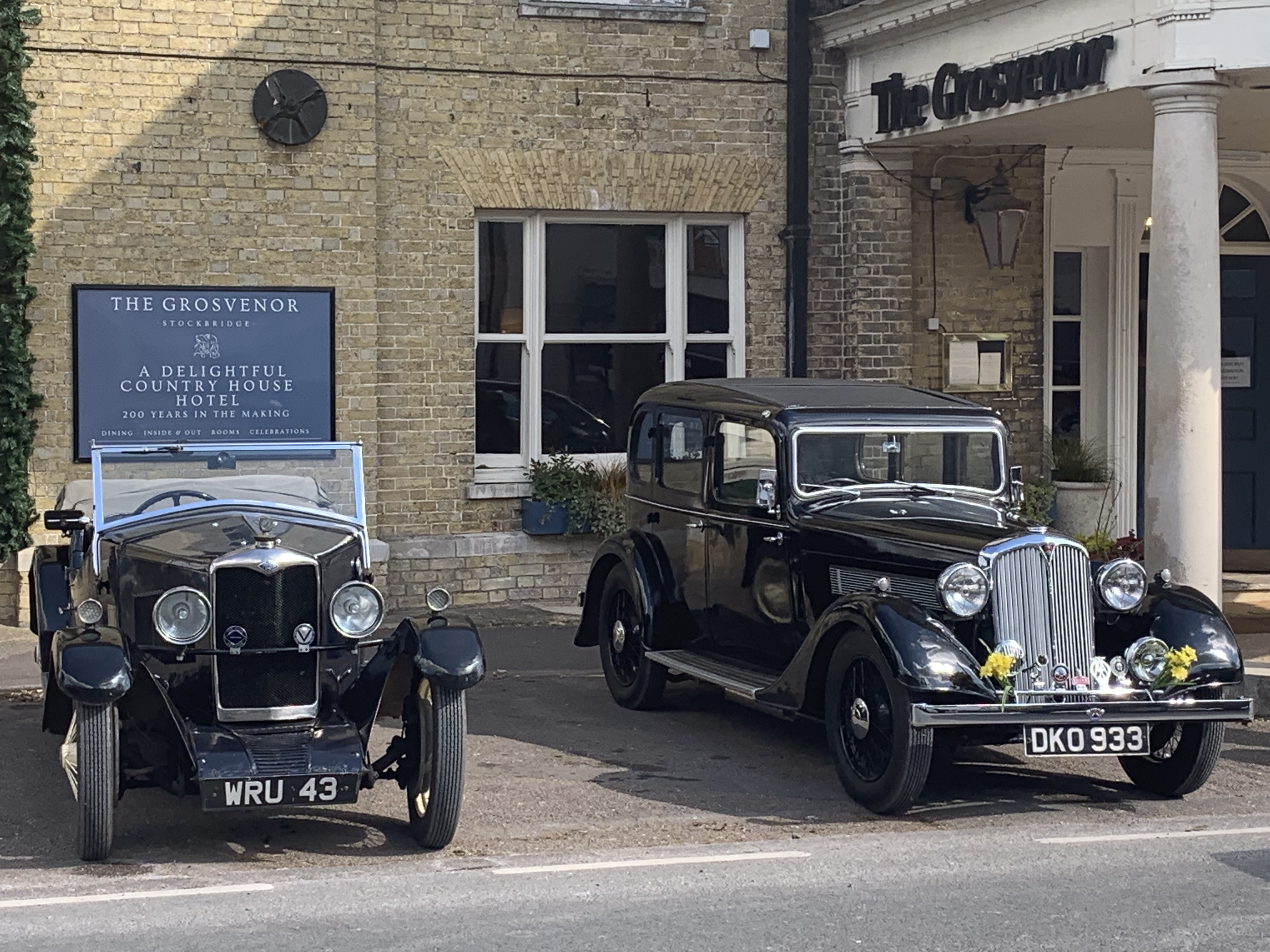 Bean Car Rally 2 Cars Front of Hotel