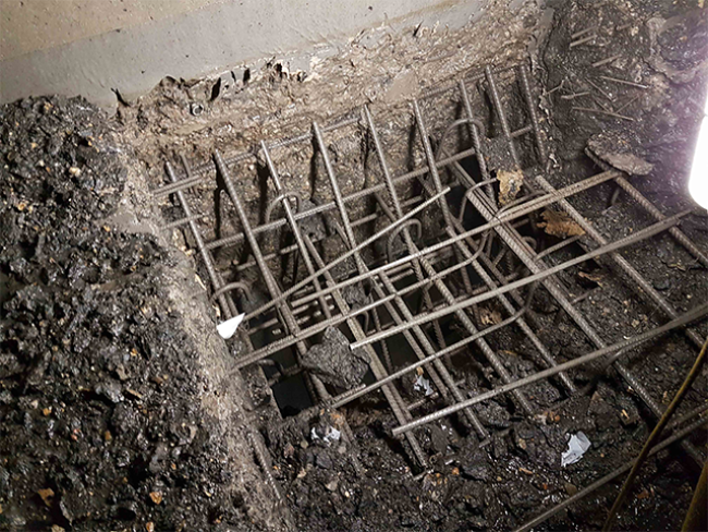 Concrete-removed-to-expose-existing-re-inforcement.png