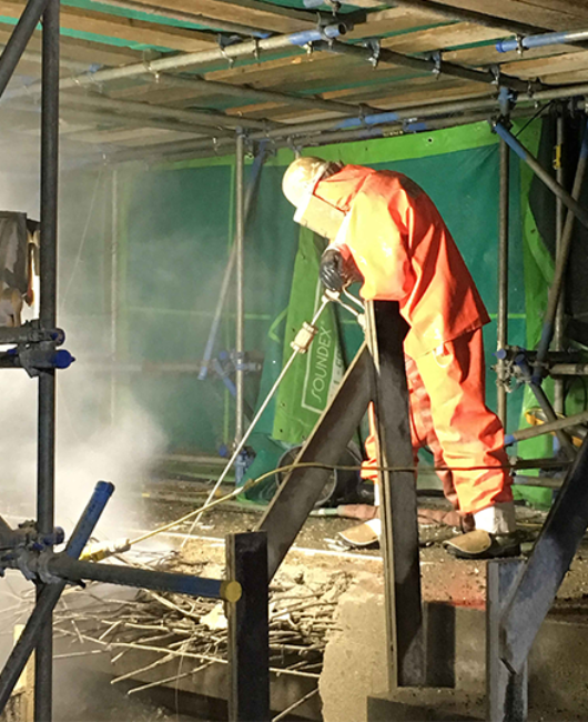 Exposed-reinforcing-bar-on-parapet-wall-joint.png